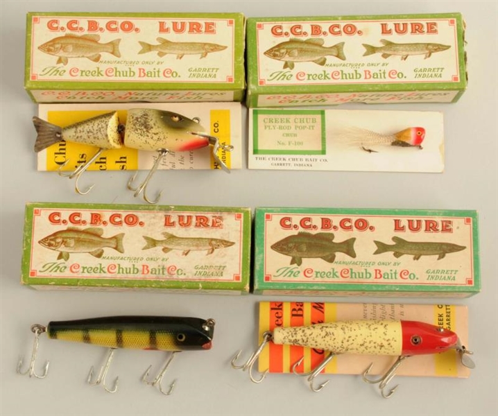 LOT OF 4:  ASSORTED CREEK CHUB BAITS IN BOXES.    