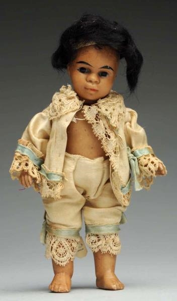 POUTY BROWN CHARACTER DOLL.                       