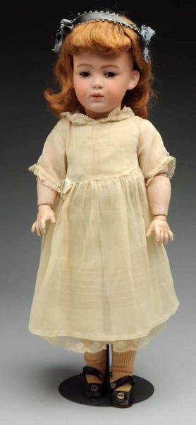 DIMPLED HEUBACH CHARACTER DOLL.                   