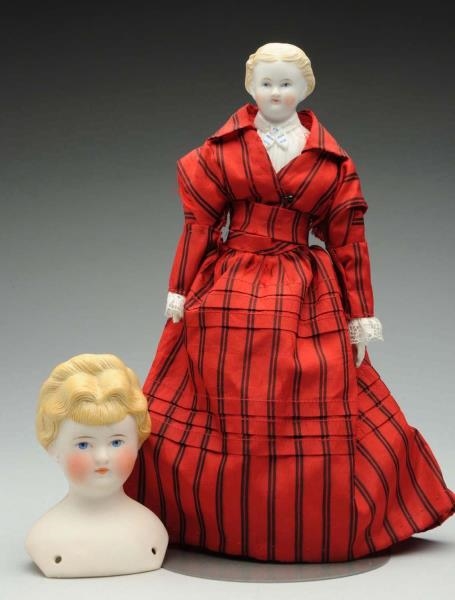 LOT OF 2: DOLL ITEMS.                             