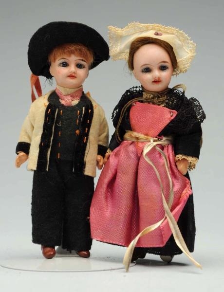 PAIR OF FRENCH BISQUE DOLLS.                      