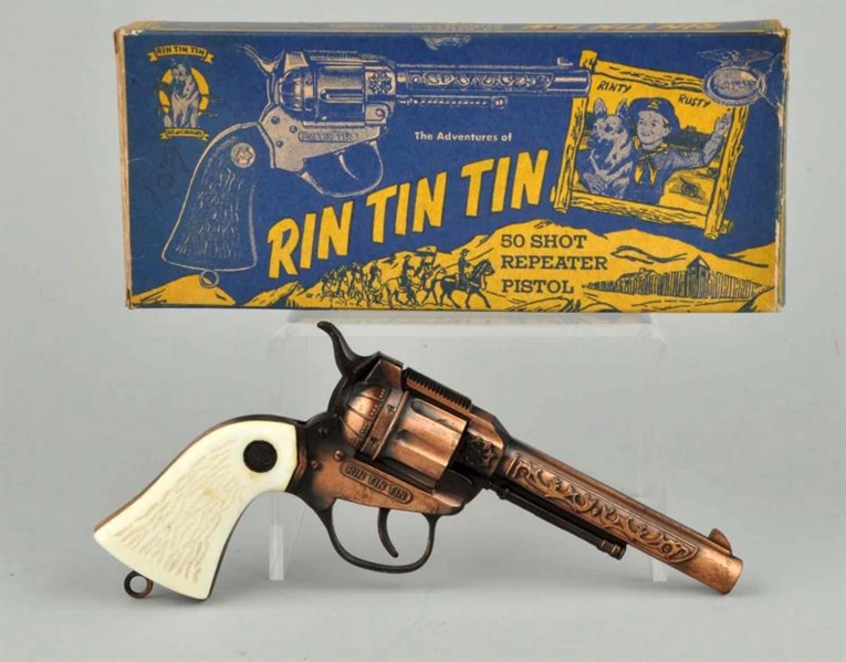 RIN TIN TIN GUN IN BOX.                           