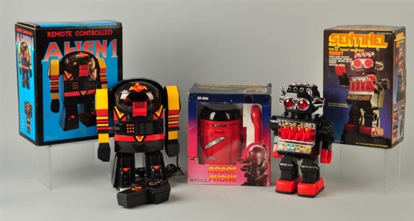LOT OF 3: MODERN ROBOTS WITH BOXES.               