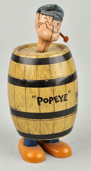 CHEIN TIN LITHO WIND-UP POPEYE IN BARREL TOY.     