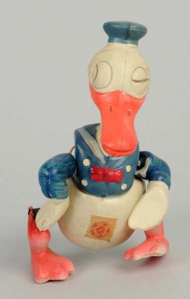 JAP. DISNEY CELLULOID WIND-UP WADDLING DONALD TOY.