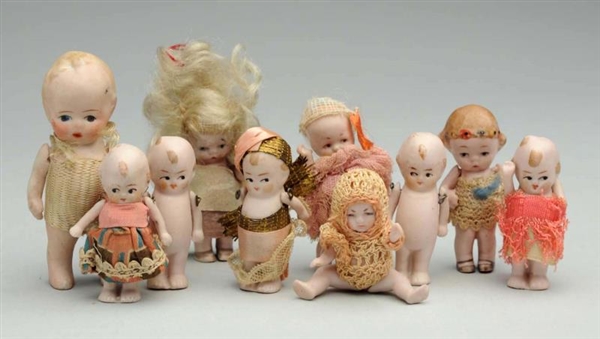 LOT OF 10: ALL-BISQUE DOLLS.                      