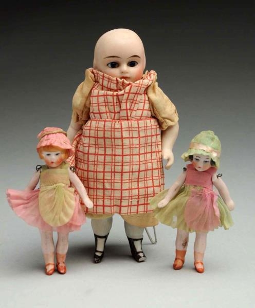 LOT OF 3: ALL-BISQUE GERMAN DOLLS.                