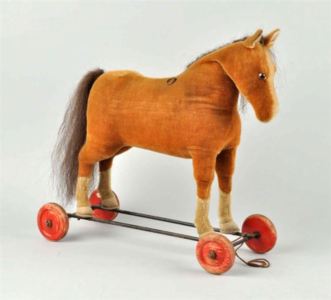 STRAW FILLED HORSE PULL TOY.                      