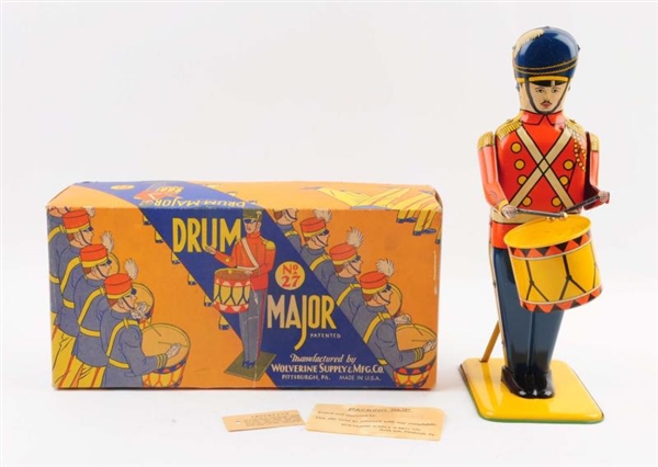 WOLVERINE TIN LITHO WIND-UP DRUM MAJOR TOY.       