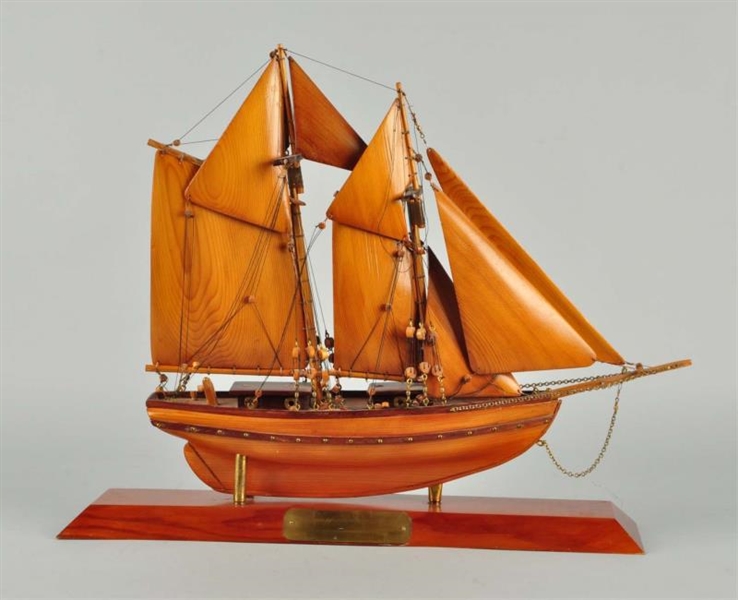WOODEN SHIP ON STAND.                             