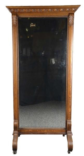 LARGE CARVED OAK AND BEVELED GLASS MIRROR CABINET 