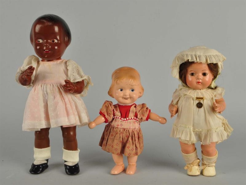 LOT OF 3: COMPOSITION DOLLS.                      