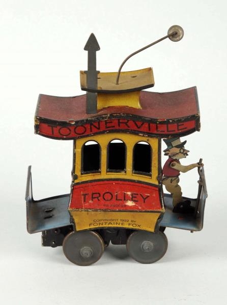 NIFTY TIN LITHO WIND-UP TOONERVILLE TROLLEY TOY.  