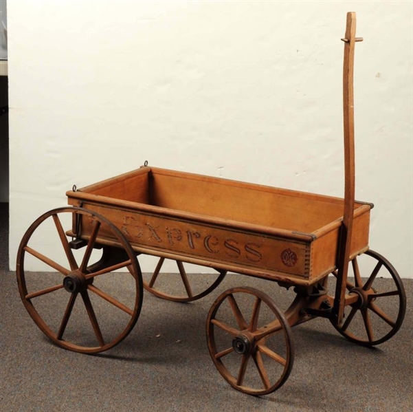EARLY WOODEN PULL WAGON.                          