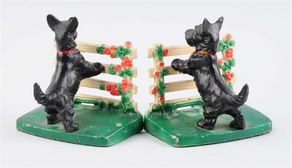 CAST IRON SCOTTIE BY FENCE BOOKENDS.              