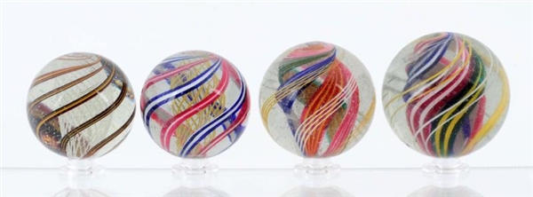 LOT OF 4: LARGE SWIRL MARBLES.                    