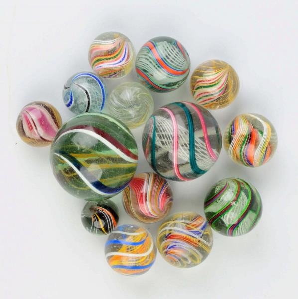 LOT OF 14: LARGE SWIRL MARBLES.                   