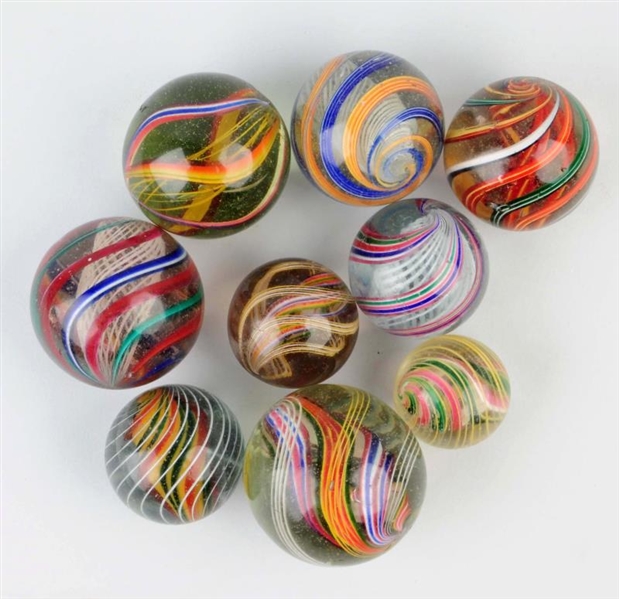 LOT OF 9: LARGE SWIRL MARBLES.                    