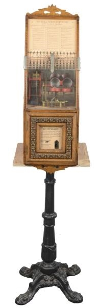 CLAWSON AUTOMATIC DICE MACHINE ON STAND           
