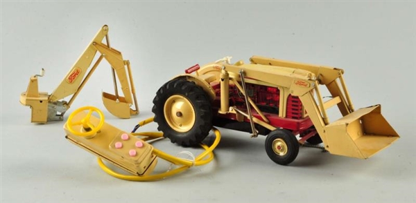 JAPANESE BATTERY OPERATED FORD TRACTOR.           