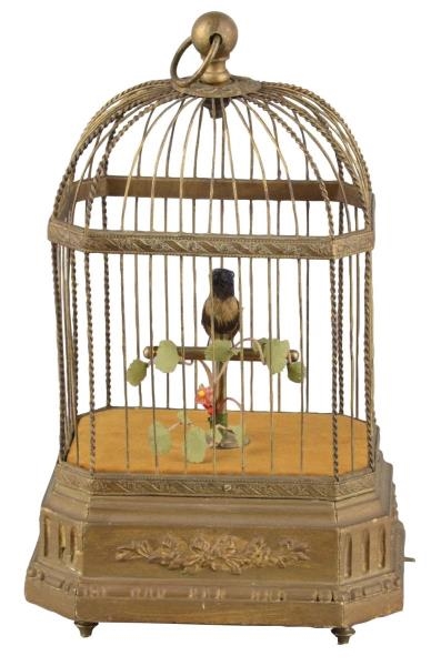 SINGING BIRD IN CAGE WINDUP DECORATION            