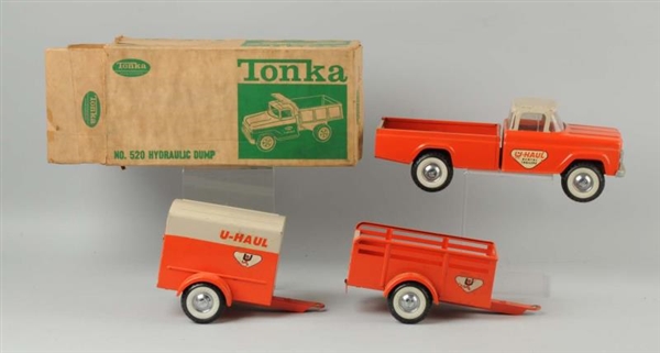 LOT OF 4: TONKA TRUCK IN BOX WITH 2 TRAILERS.     