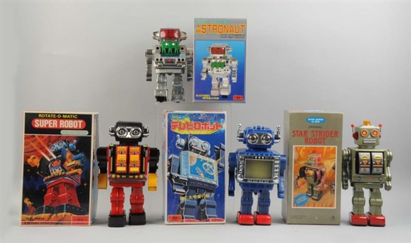 LOT OF 4:  JAPANESE BATTERY OPERATED ROBOTS.      