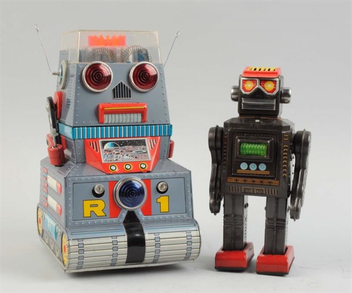 LOT OF 2: JAPANESE TIN LITHO SILVER ROBOTS.       