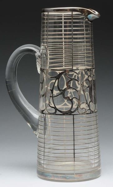 SILVER OVERLAY PITCHER.                           