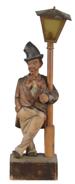 CARVED WOODEN WHISTLER WITH LIGHT POST            
