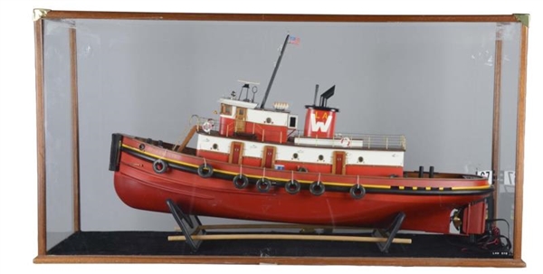 RADIO CONTROLLED MODEL BOAT IN DISPLAY CASE       