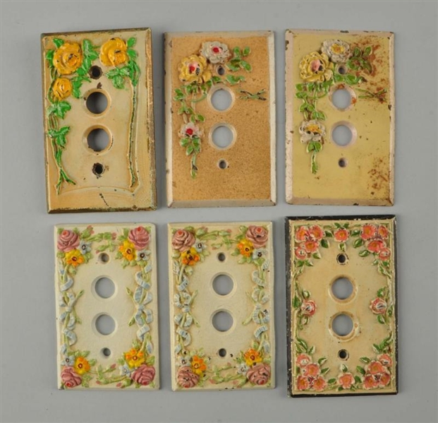 LOT OF 6: CAST IRON SWITCH PLATES.                