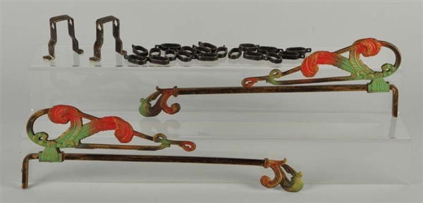 CAST IRON SET OF CURTAIN RODS.                    