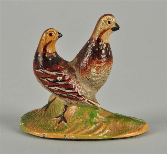 CAST IRON QUAIL PAPERWEIGHT.                      