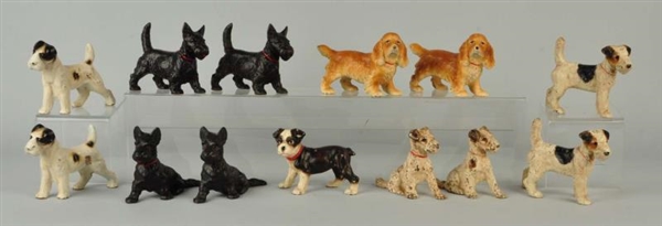 LOT OF 13: CAST IRON DOG BOOKENDS.                