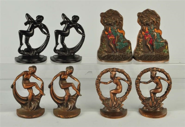 LOT OF 8: CAST IRON FIGURAL BOOKENDS.             