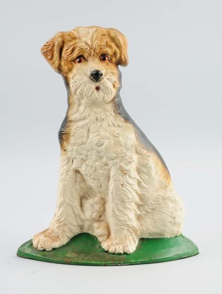 CAST IRON OVERSIZED WIREHAIRED FOX TERRIER.       