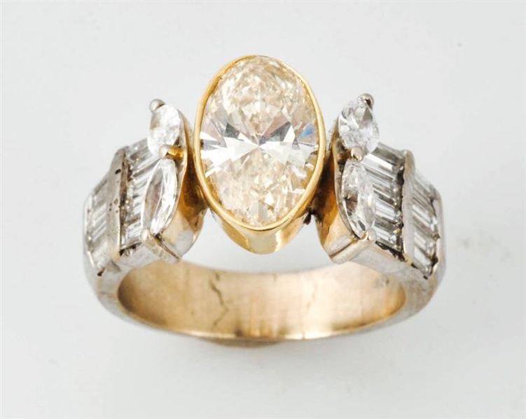 NATURAL LIGHT FANCY OVAL SOLITAIRE DIAMOND RING.  