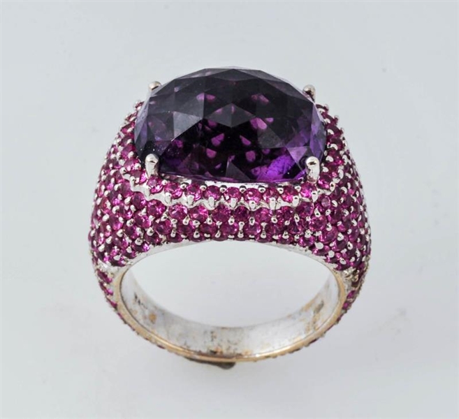 PINK SAPPHIRE AND AMETHYST RING.                  
