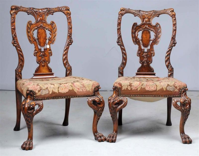 PAIR OF VINTAGE CARVED WOODEN CHAIRS.             