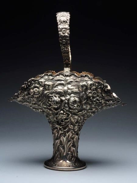 STIEFF REPOUSSE STERLING FLOWER VASE.             
