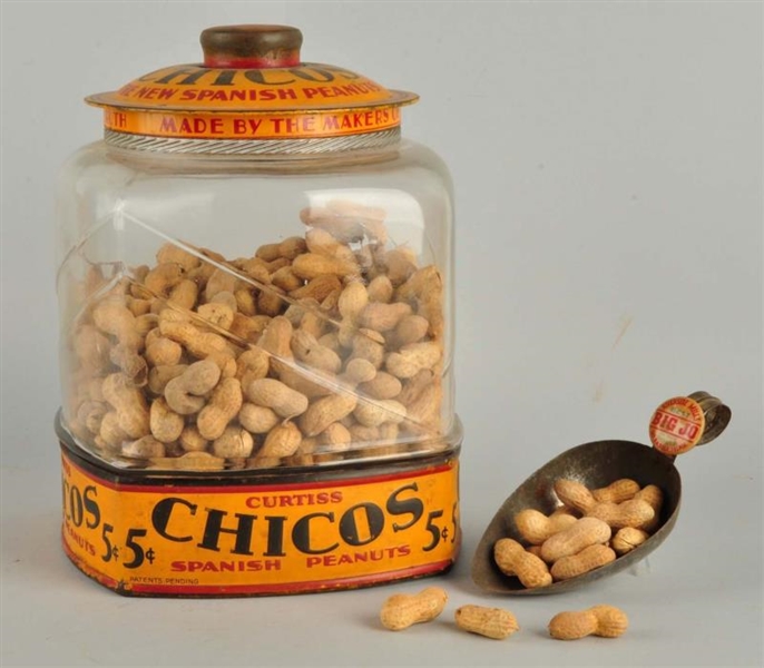 CURTIS CHICOS PEANUT JAR WITH EMBOSSED GLASS.     