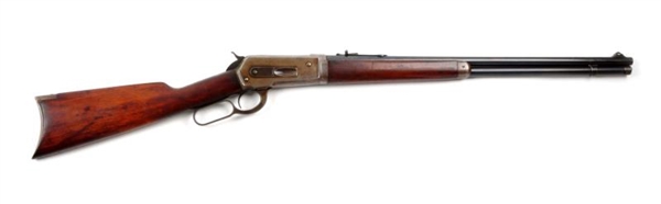 (C) WINCHESTER MODEL 1886 LEVER ACTION RIFLE.     