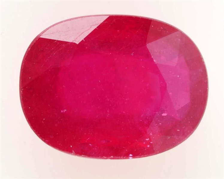 UNSET OVAL CUT SYNTHETIC RUBY.                    