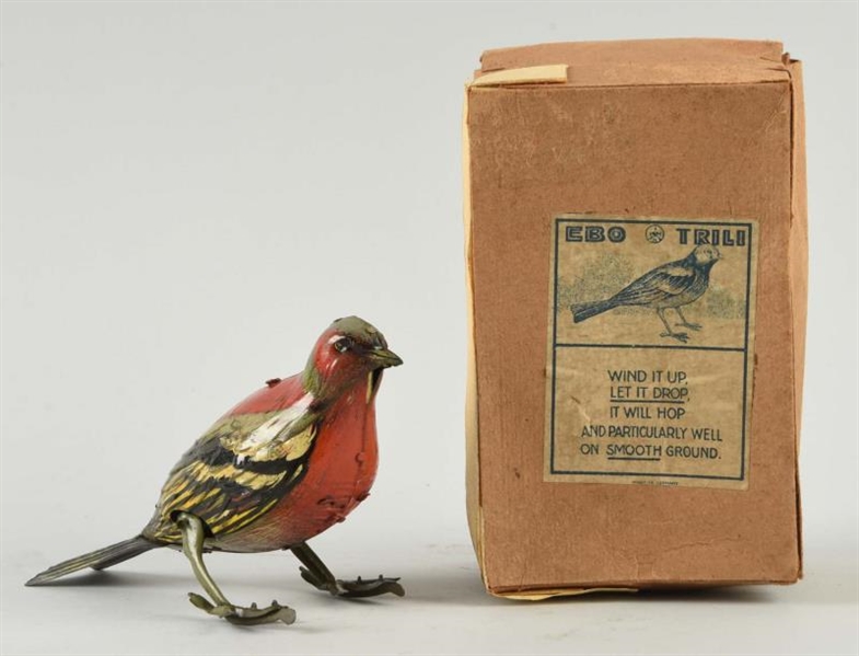 GERMAN TIN LITHO & HAND PAINTED EBO TRILLI BIRD.  