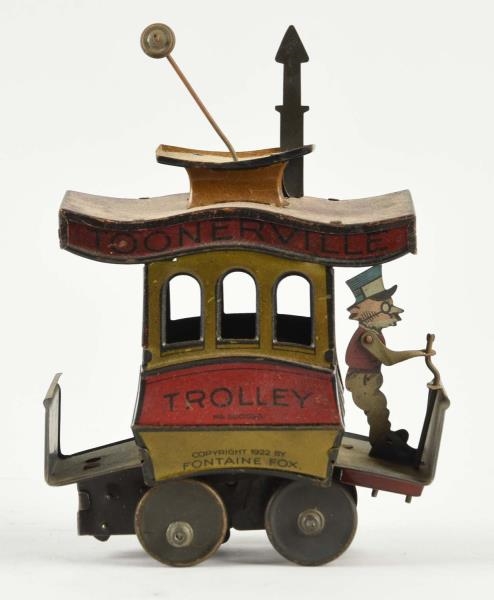 GERMAN NIFTY TIN  WIND UP TOONERVILLE TROLLEY TOY.