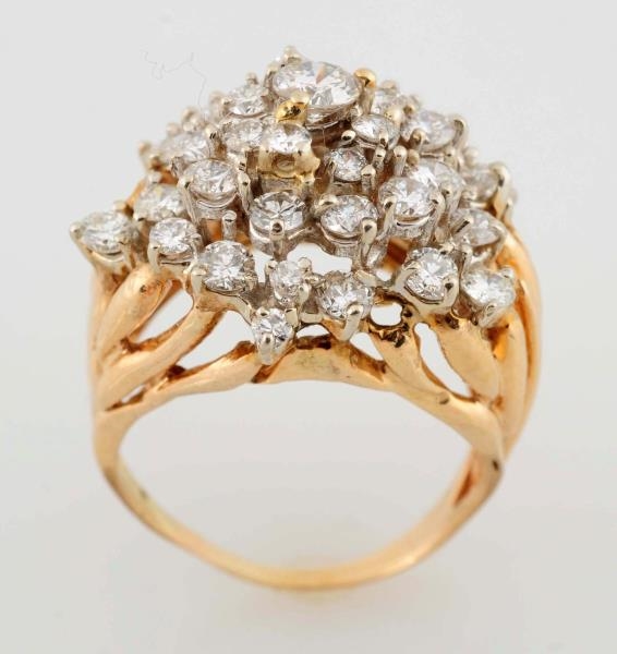 A DIAMOND AND 14KT GOLD RING                      