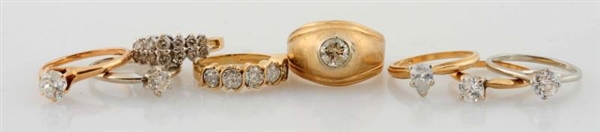 A GROUP OF EIGHT DIAMOND AND GOLD RINGS           