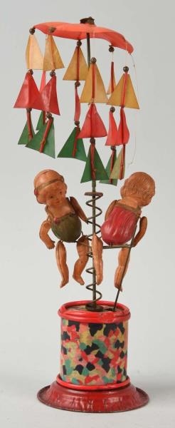 UNUSUAL PRE-WAR JAPANESE CELLULOID WHIRLIGIG TOY. 