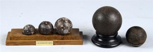 LOT OF 5: EXCAVATED CANNON BALLS.                 